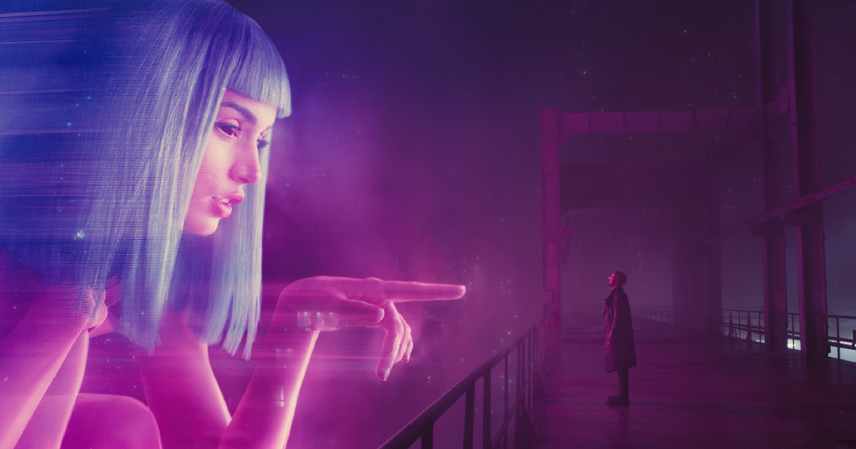 un ologramma indica ryan gosling, come a dire: anche blade runner 2049 sarà un top of the flop - nerdface 