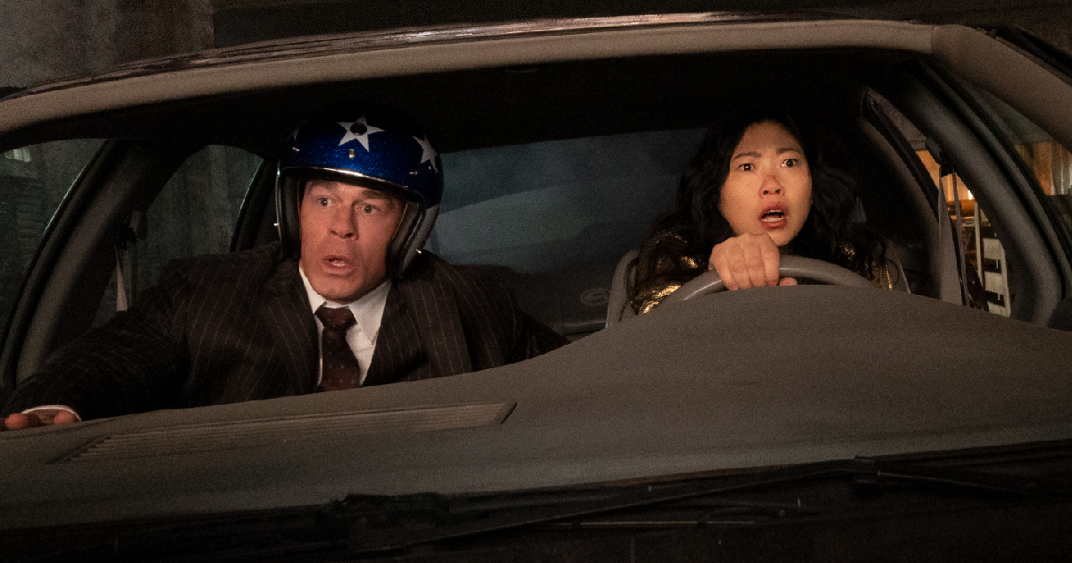 awkwafina e john cena in un'auto in jackpot - nerdface